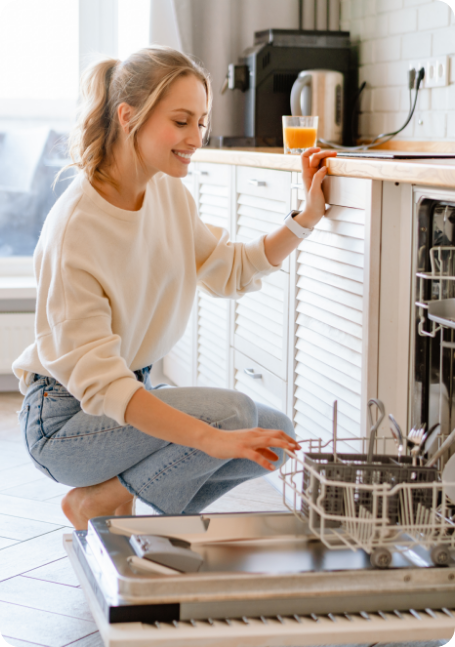 Person loading dishwasher